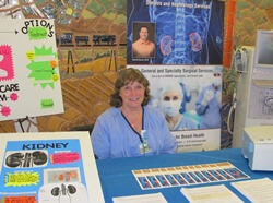 nurse behind a table